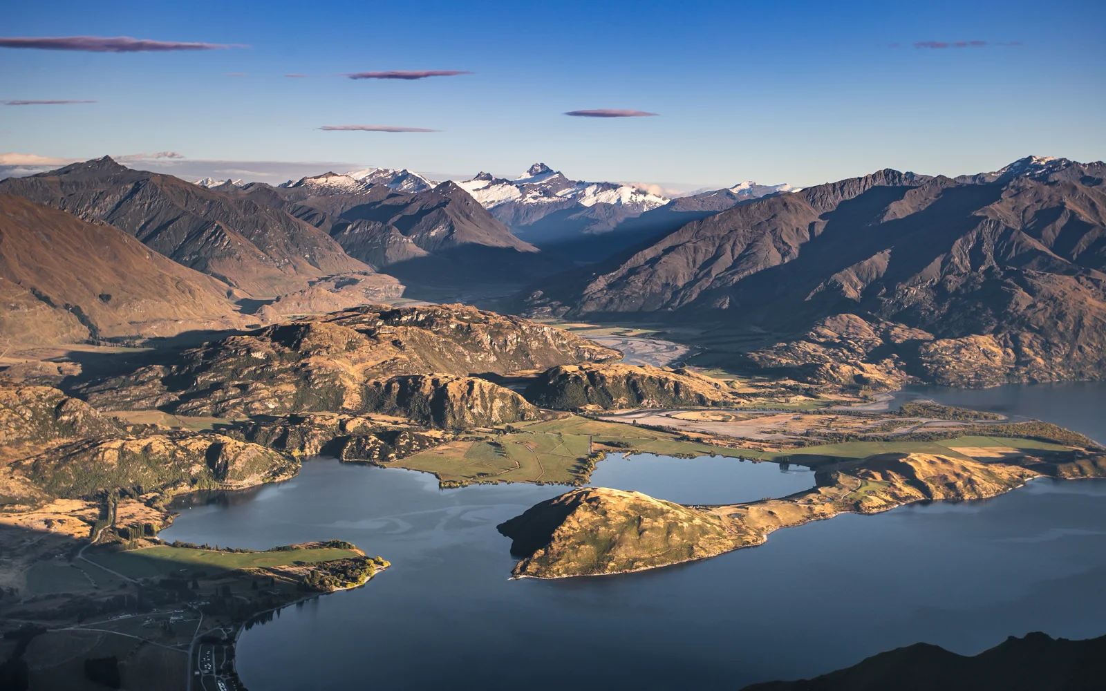 New Zealand lake and mountain landscape representing a considered financial future
